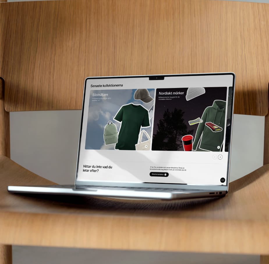 Laptop som visar sidan för senaste kollektionerna på Scantras webbplats